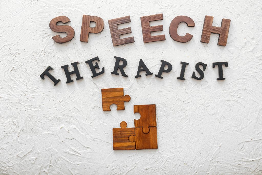 A picture of the word Speech therapist and a puzzle with 1 piece missing. Inpatient Rehabilitation Facility