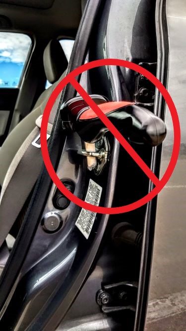 Emson Car Door Assist Handle for Older Adults demonstrated the wrong way inside of a door latch. 