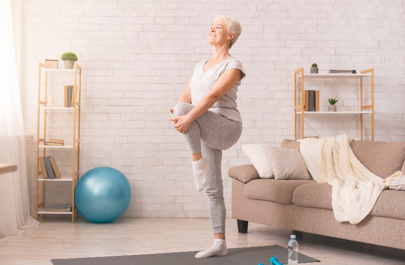 Caucasian woman stretchng legs