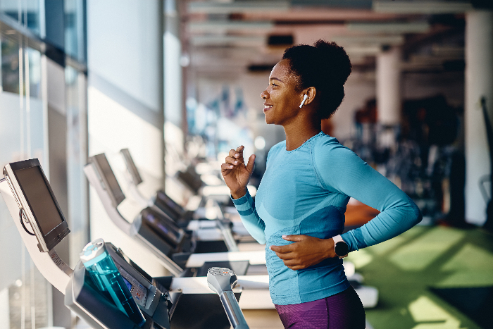 African american woman exercising on the treadmill